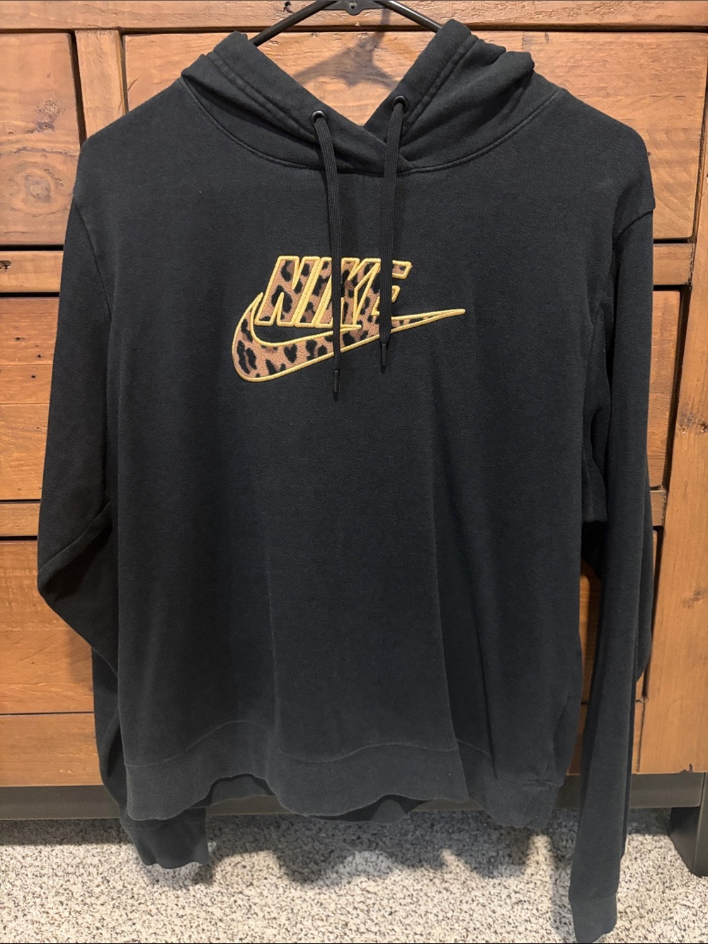 Nike Black Crewneck Sweater with Leopard Logo Accent